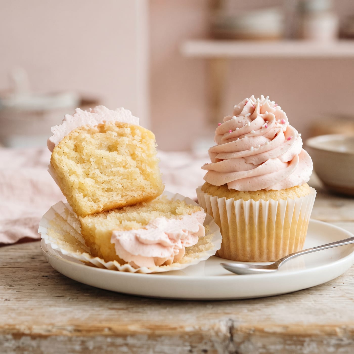 Close up of a cooled cupcake top showing a light and moist crumb texture